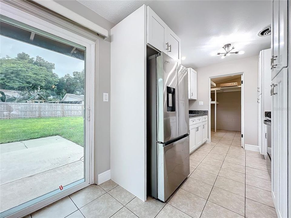 Stainless steel appliances in your newly renovated kitchen with new cabinets and solid granite countertops.