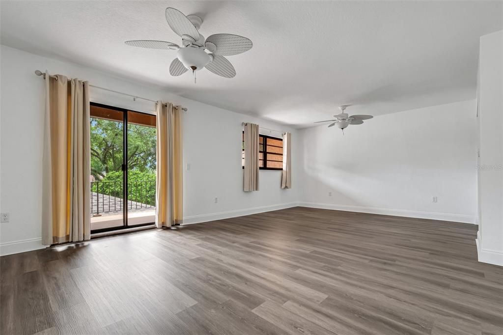 Bedroom #2 is also upstairs and measures 14' x 22' with two ceiling fans.