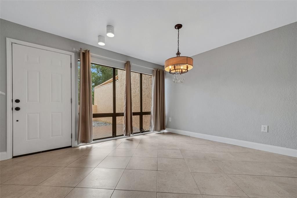 Large ceiling to floor windows front and back.