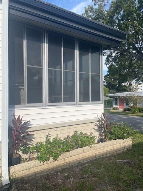 SCREENED PATIO OUTSIDE VIEW