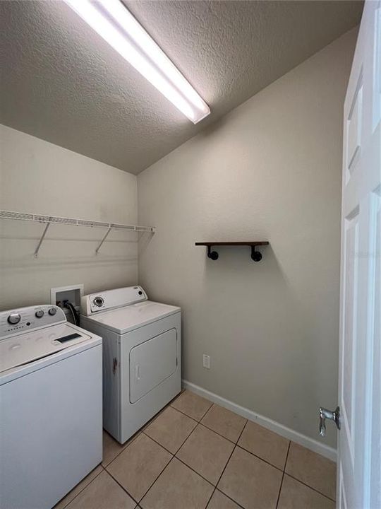 Laundry room with washer and dryer