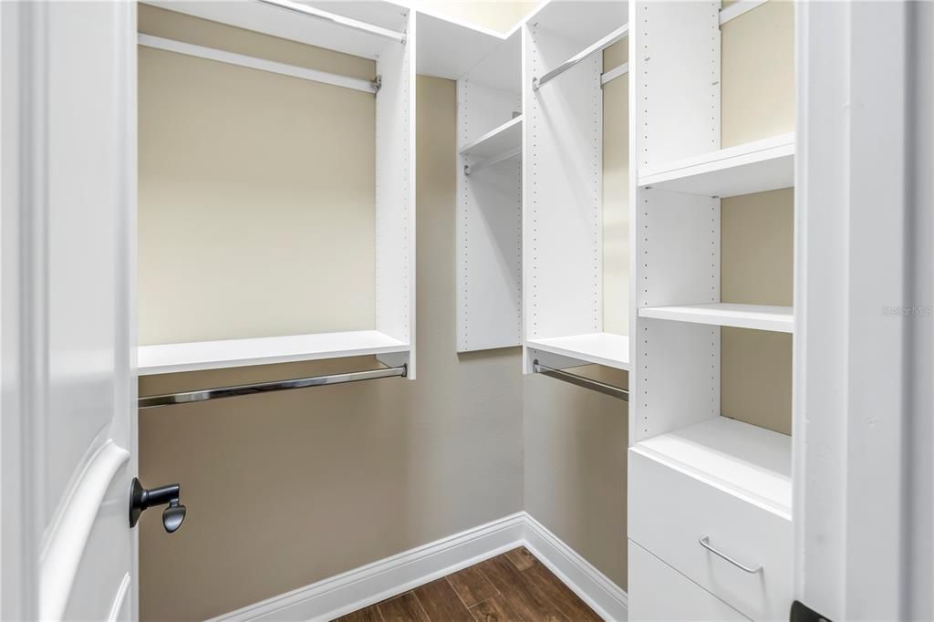 Walk-in closet with built-in shelving