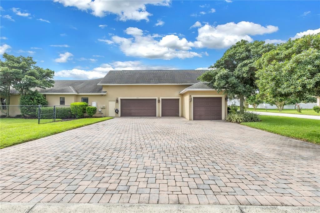 Paver driveway with plenty of parking, 5 car garage!