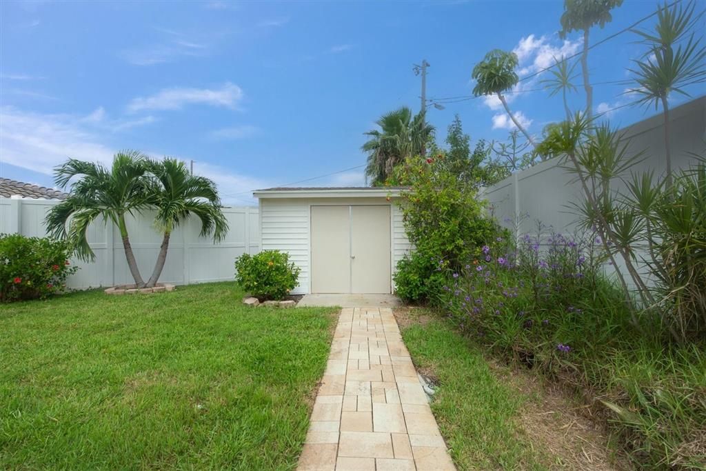 Back yard with a lush salt water pool