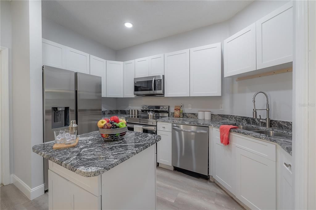 Kitchen - all new appliances, updated cabinets, and granite.