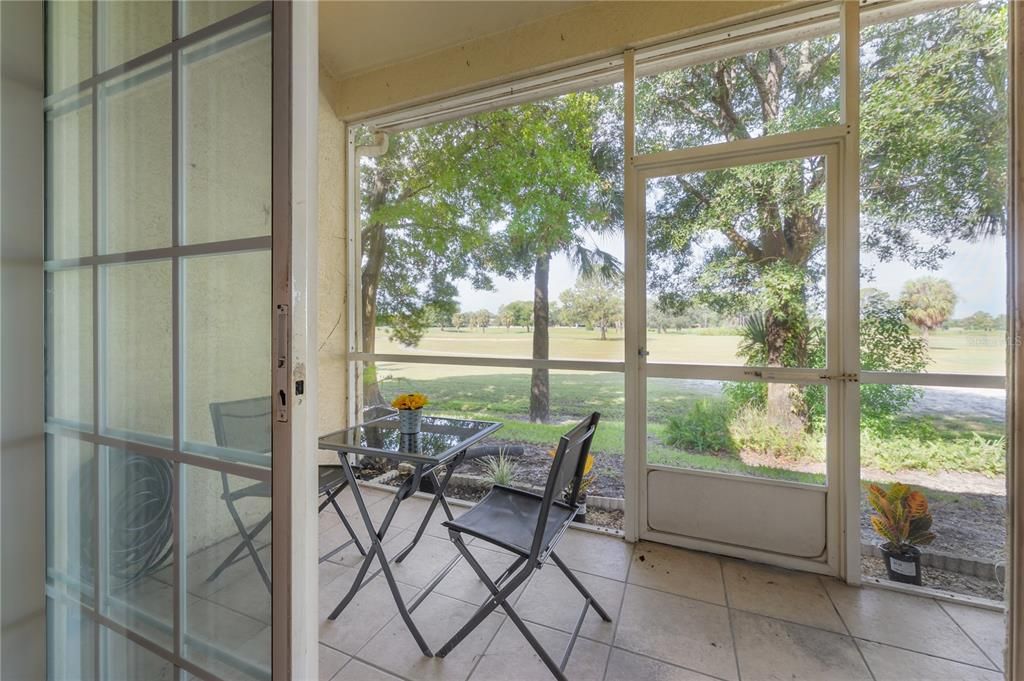 Screened Lanai (view from master bedroom) overlooking golf course