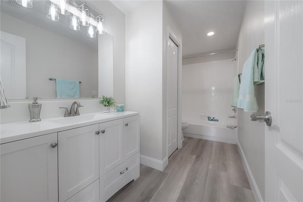 Extended full bath with linen closet