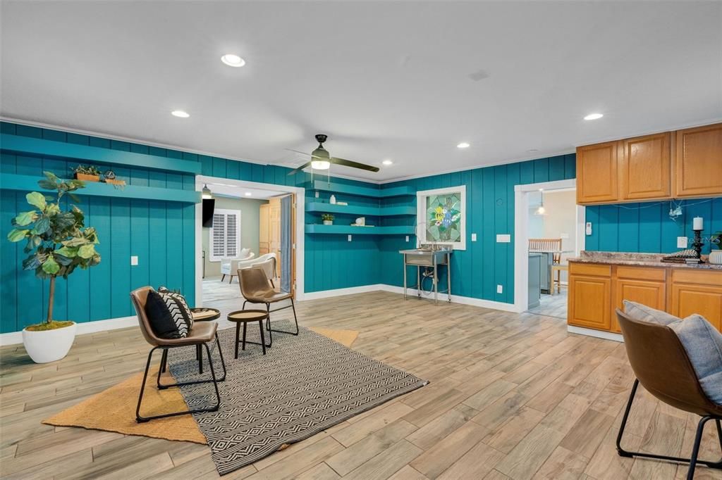 Built in wet bar with sink and additional cabinet storage~