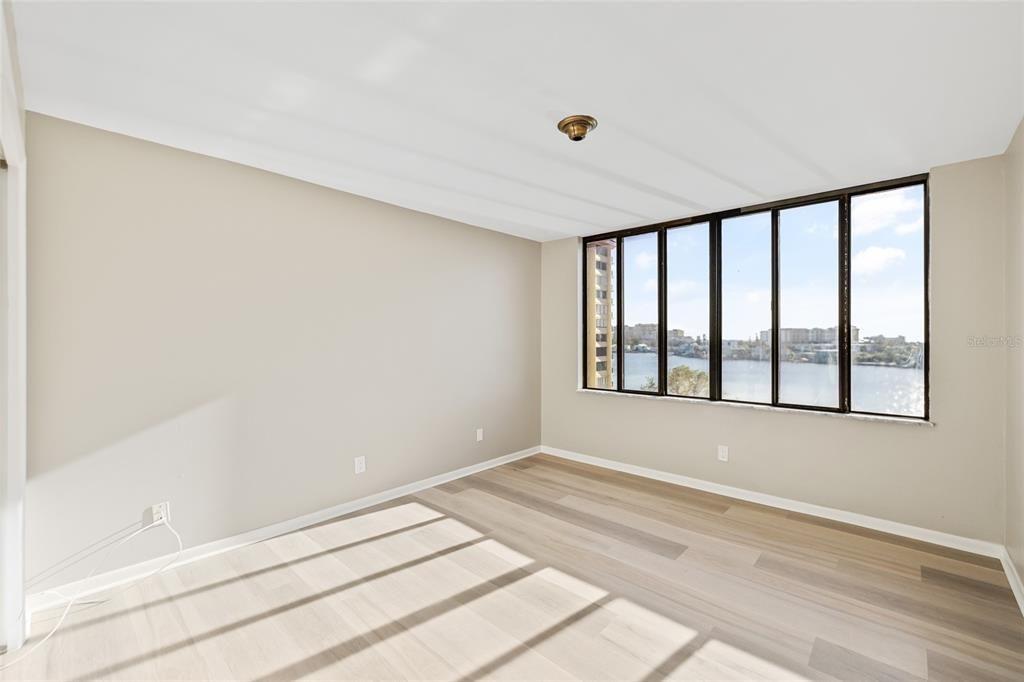 Bedroom 2 with wall to wall windows