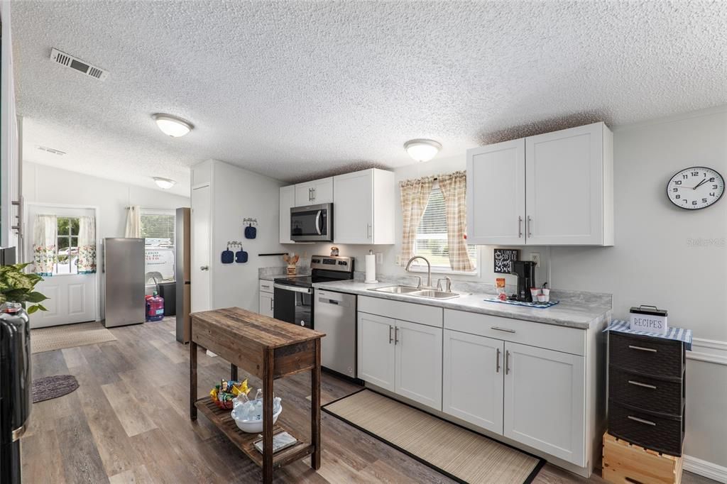 Kitchen looking at side entry