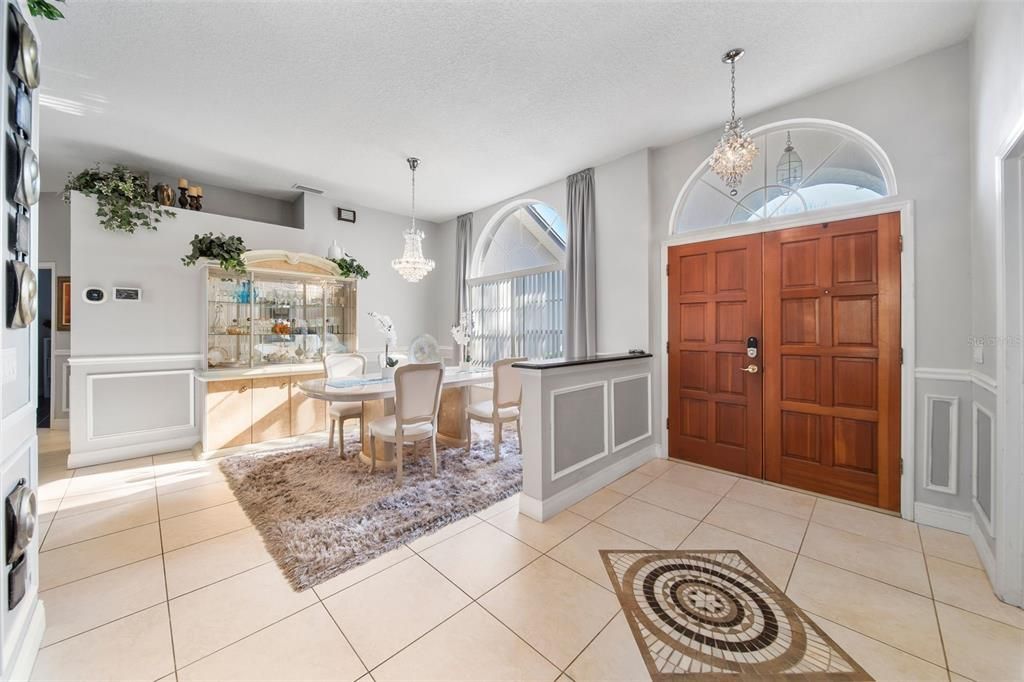 Foyer with look of formal dining room