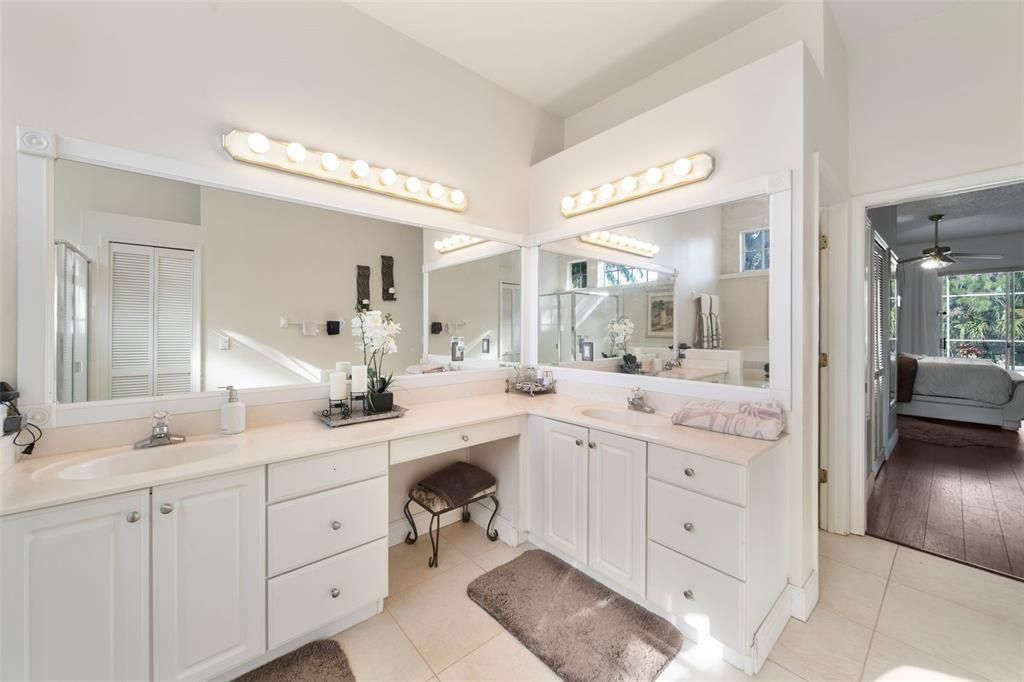 Dual Sink Vanity with view into Master Bedroom