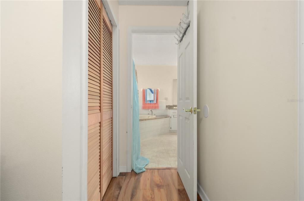 Hallway to Primary Bath/Huge Walk In Closet