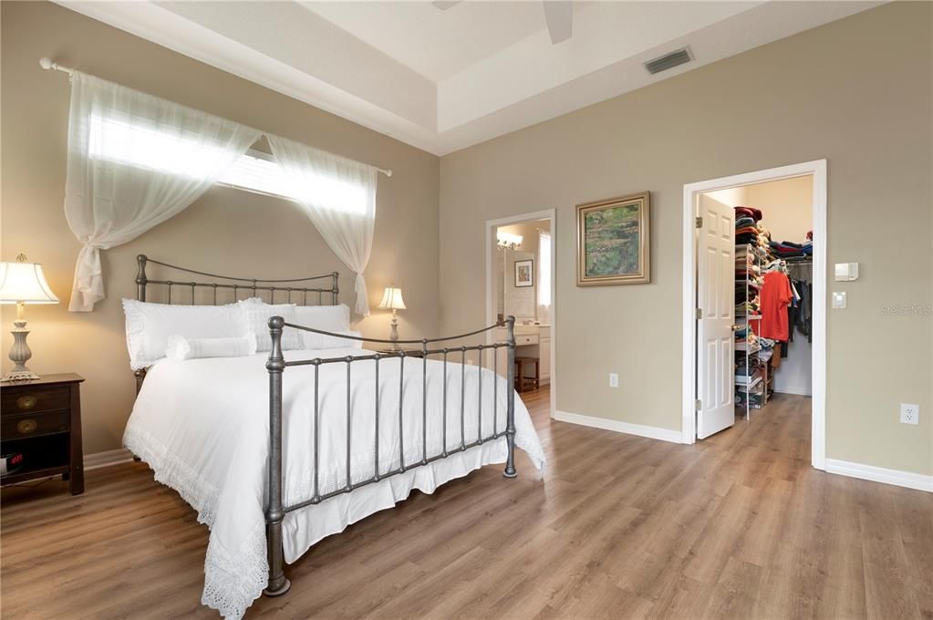 Master bedroom showing closet and bath