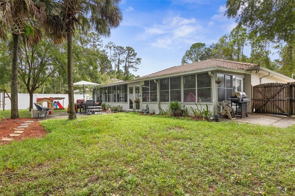 Florida room with 2 paved areas