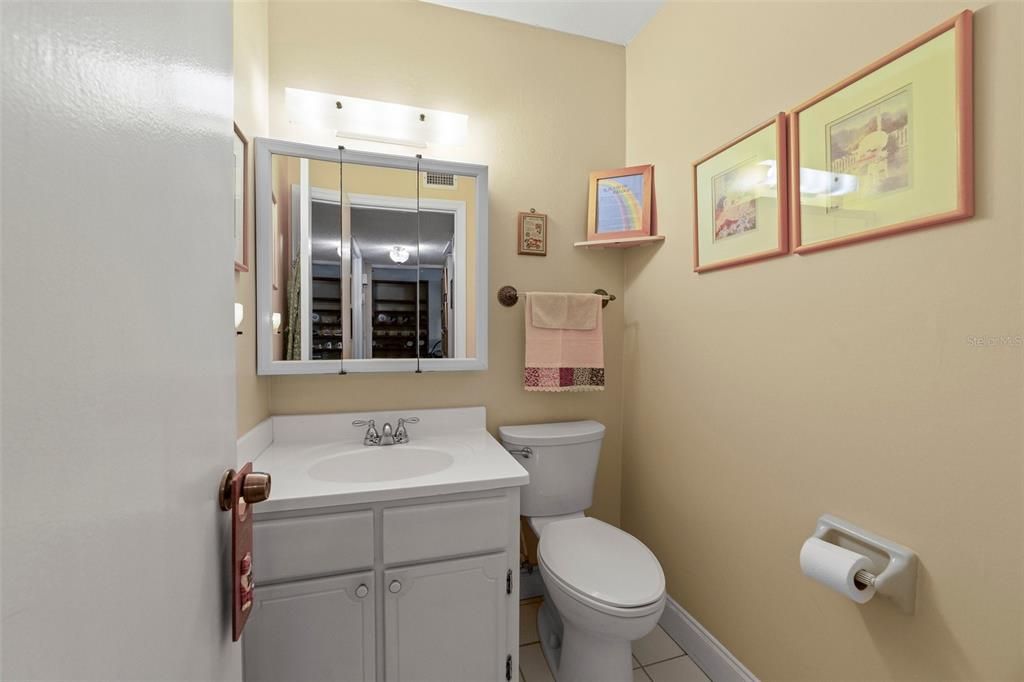 The convenient half bath is ideal for guests!