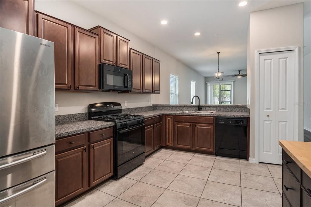 The kitchen overlooks the living room