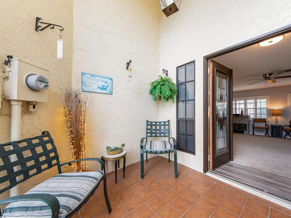 SCREENED FRONT PORCH ENTRY