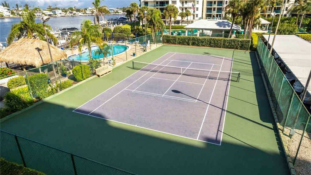 Tennis, waterfront pool, tiki with eating area, BBq, and Picnic area all for your enjoyment