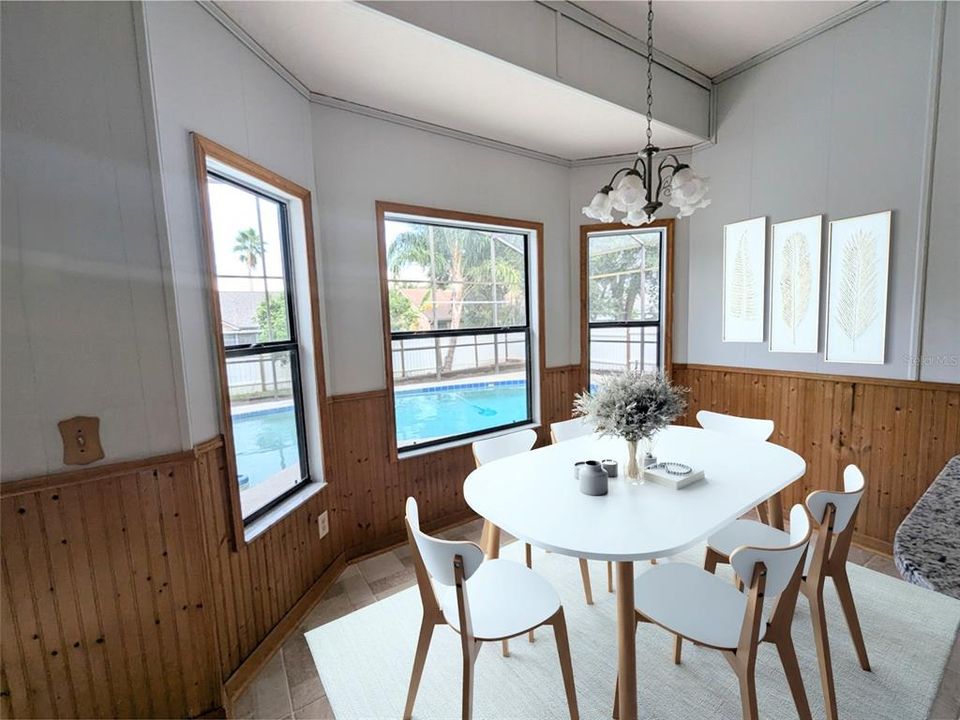 Breakfast Nook w view of the pool (staged)