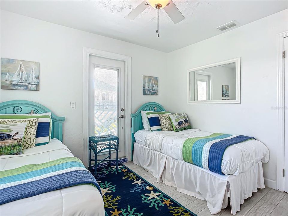 Joy by the Sea Beach House 2nd level Bedroom with Balcony