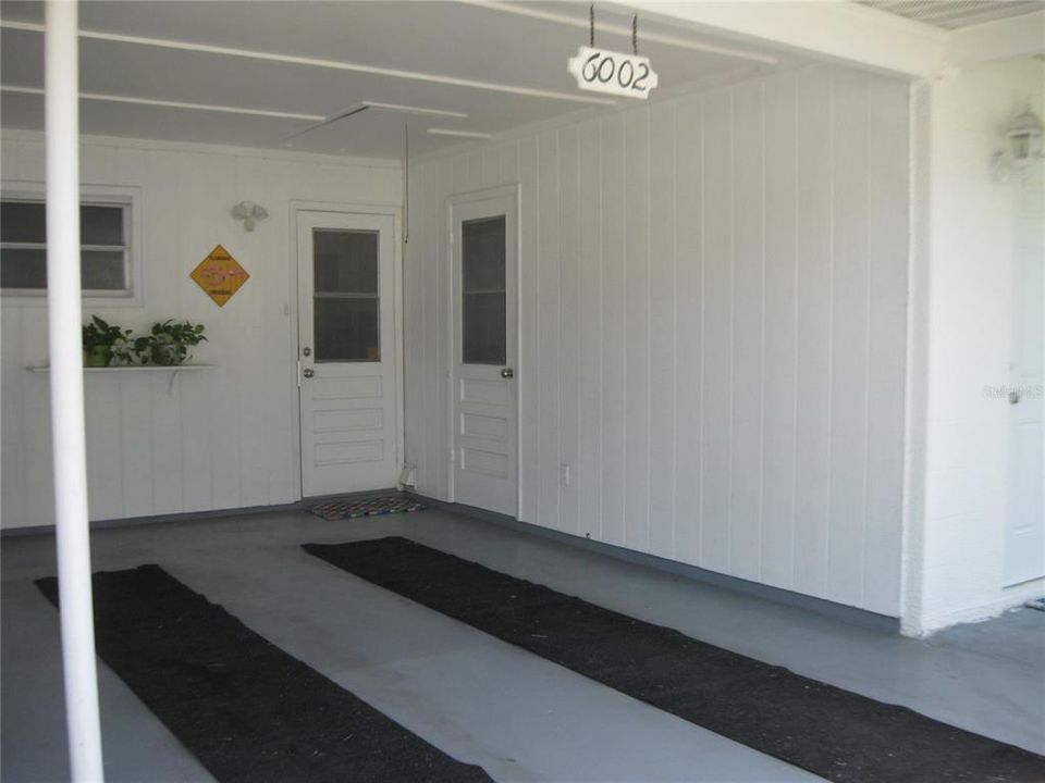 CARPORT - DOOR ON RIGHT IS TO LAUNDRY RM