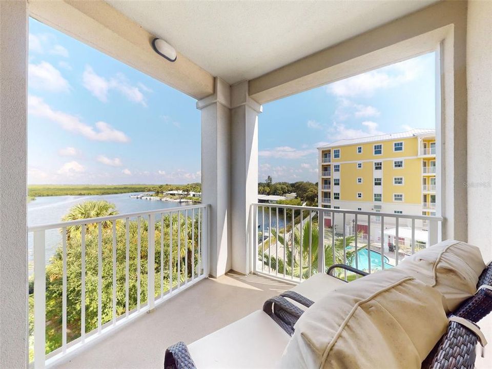 Back patio with view of pool and intracoastal waterway