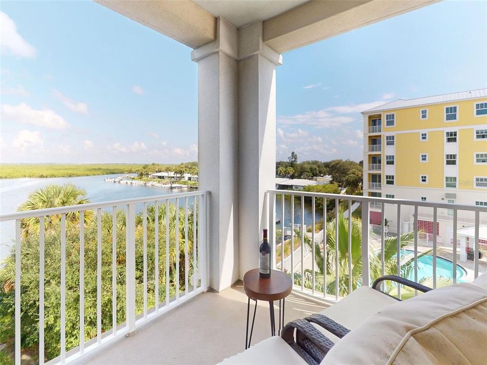 View from back patio overlooking pool and intracoastal waterway