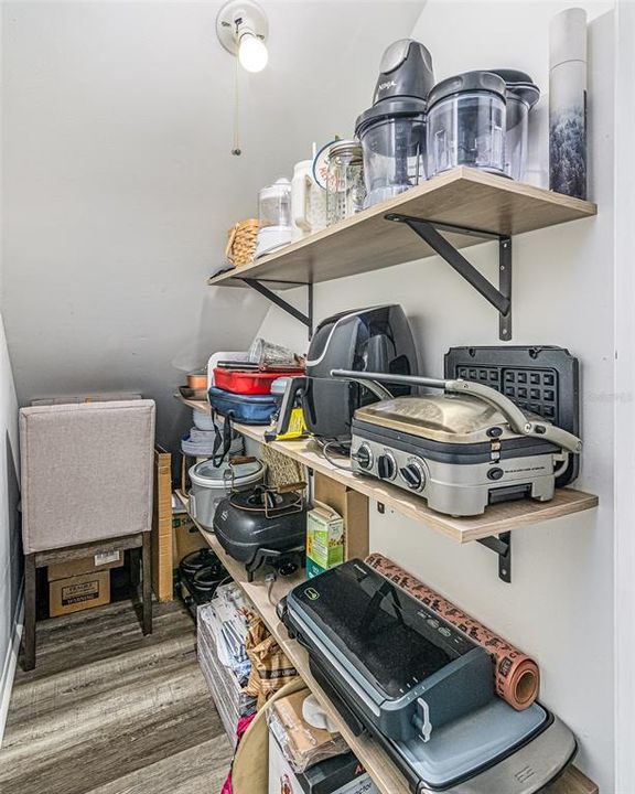 Storage room under the stairs