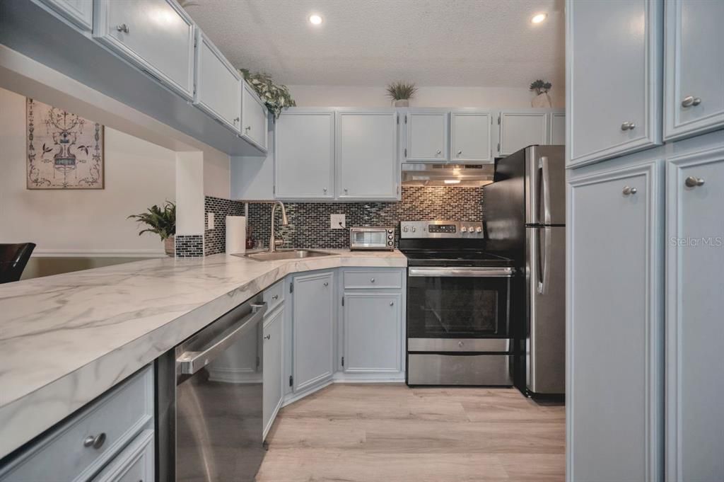 Kitchen opens to dining room, great for entertaining