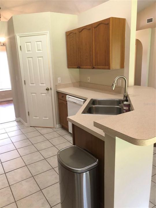 KITCHEN WITH DISHWASHER AND PANTRY