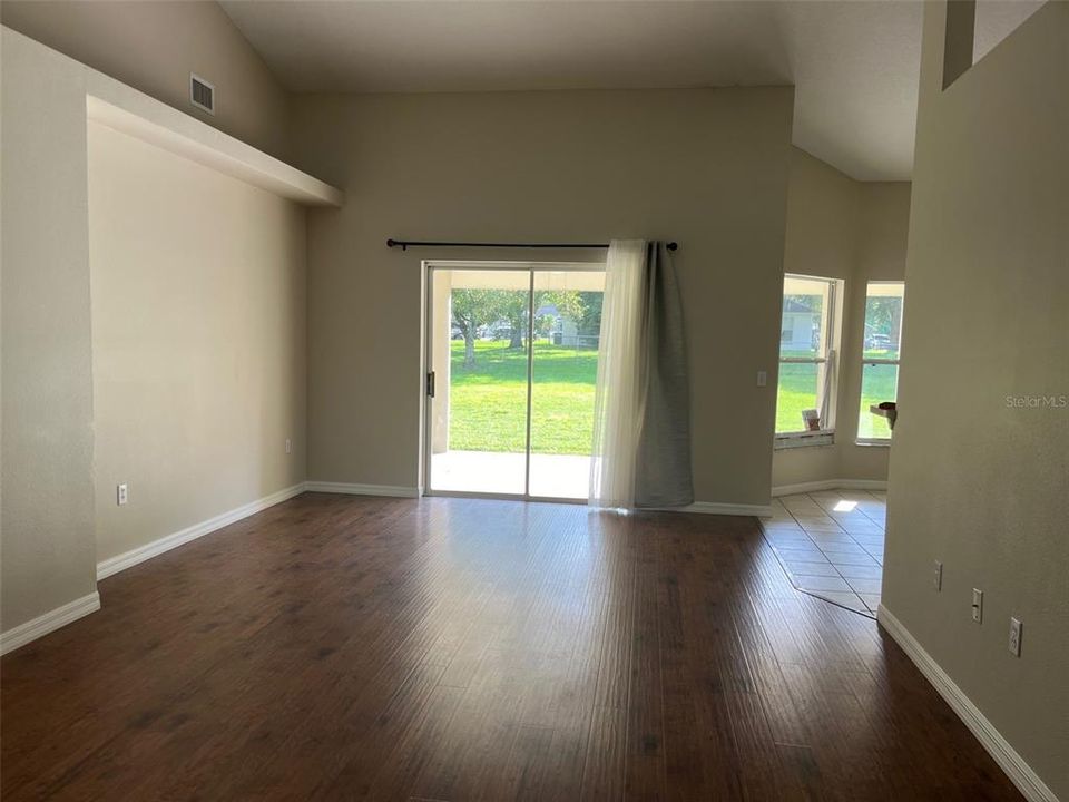 LIVING ROOM LOOKING IN EAT IN KITCHEN