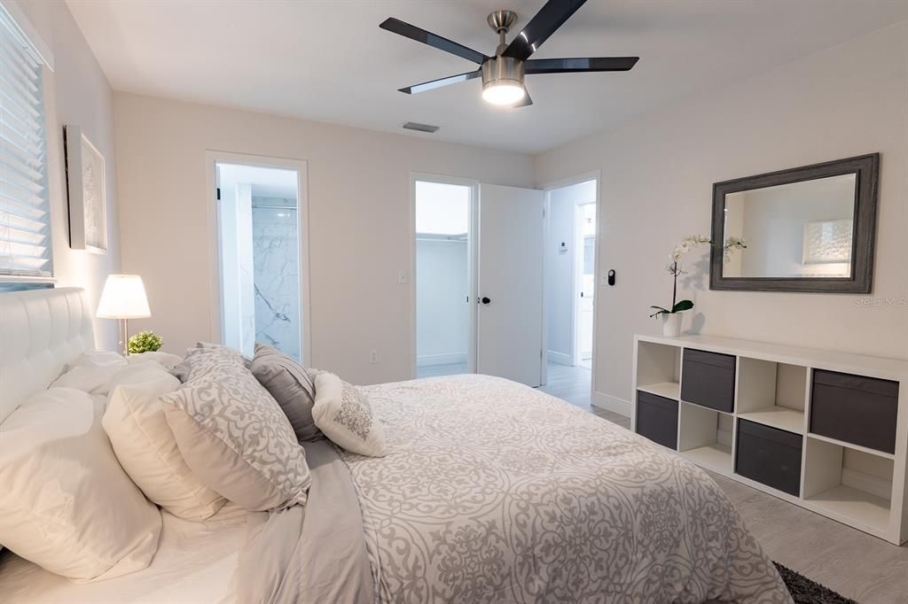 Primary Bedroom facing Walk-In Closet & Bathroom