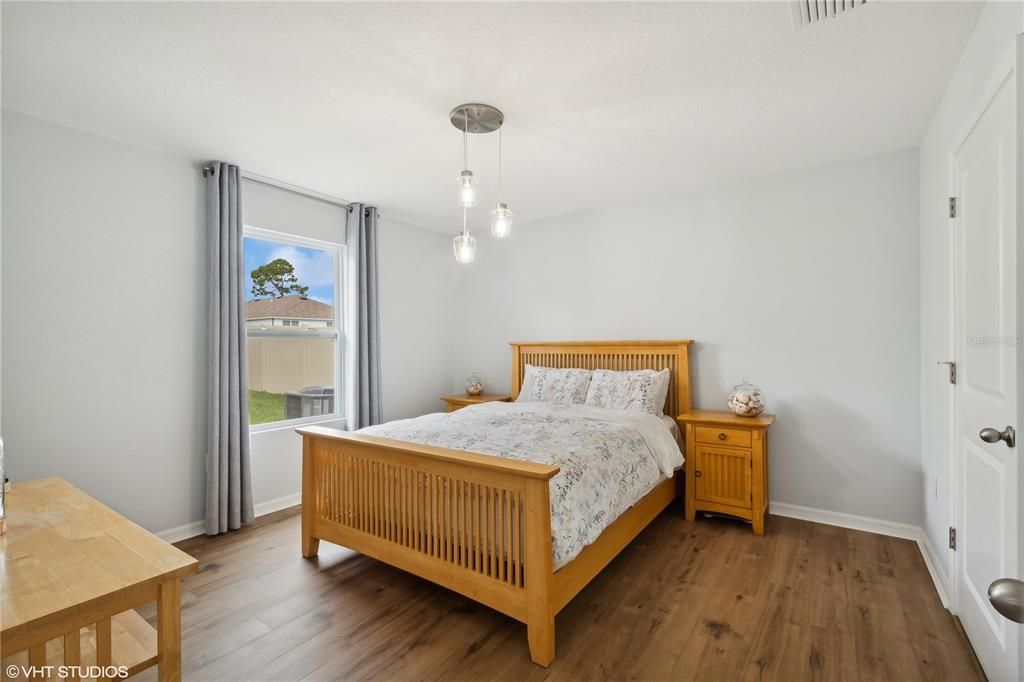 Primary bedroom with window