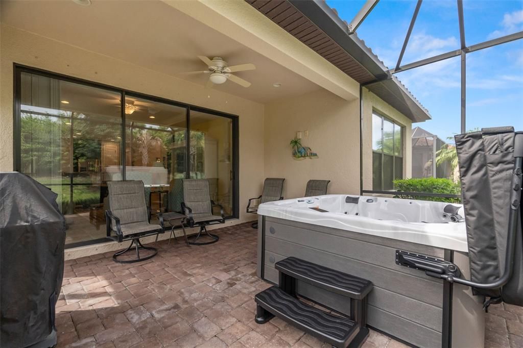 Extended screened patio with hot tub