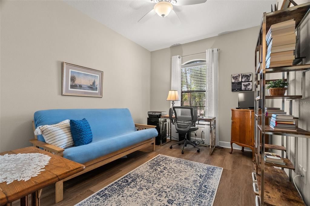 Bedroom 3 with luxury vinyl plank flooring