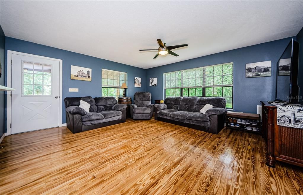 Family room and door to wraparound porch