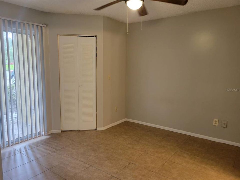 Bedroom with walk-in closet