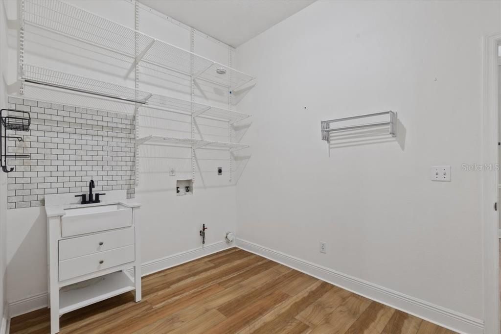 Laundry room located off Primary bath