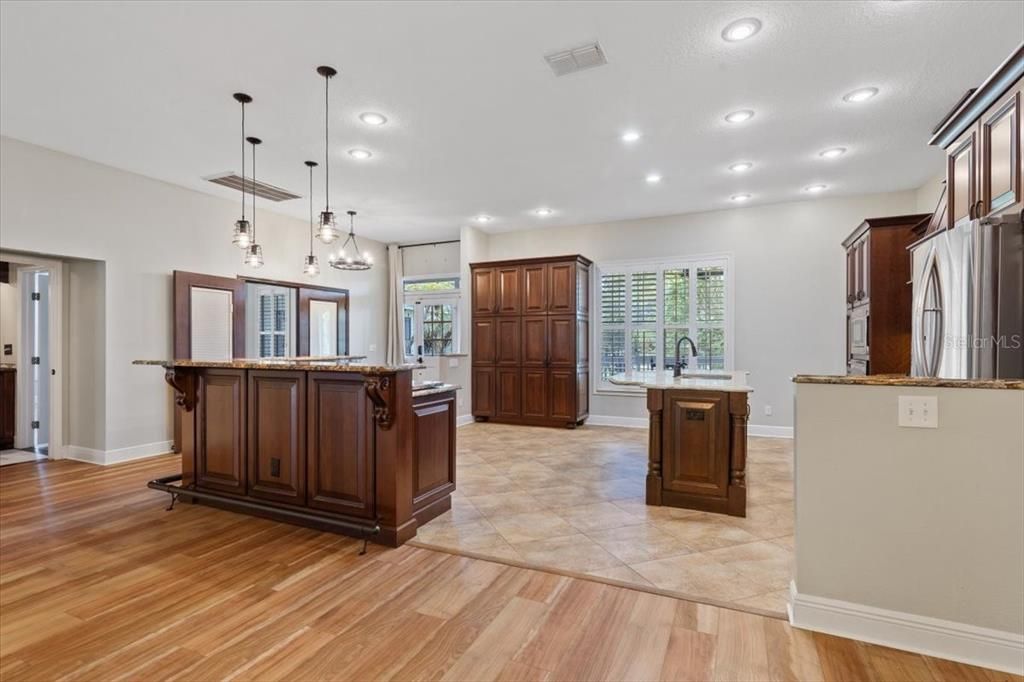 Large custom bar area with wine fridge