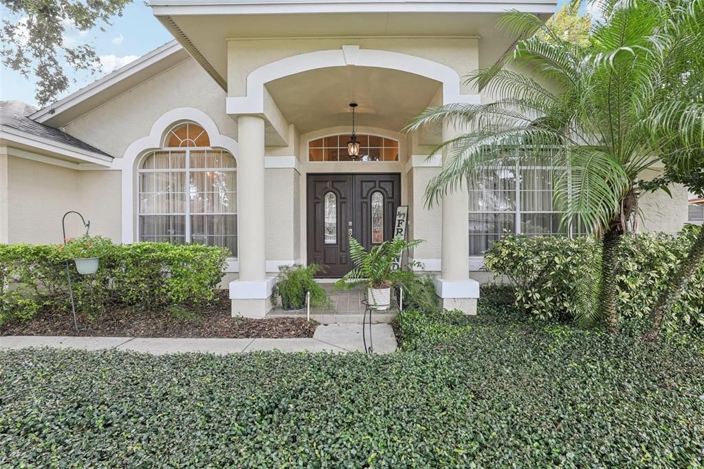 Lovely entryway with double front doors