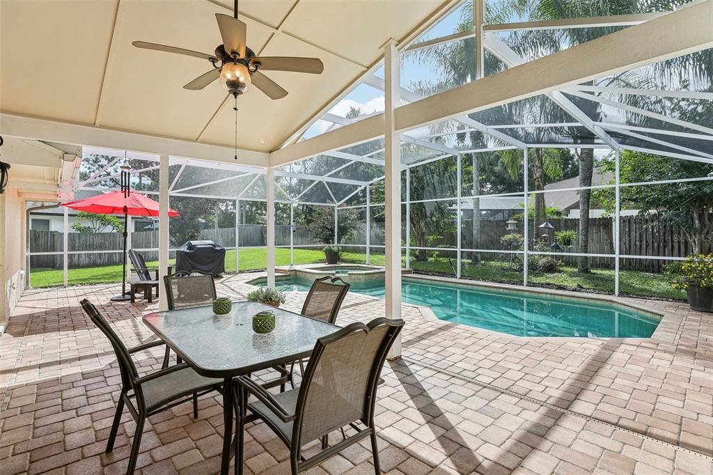 Gorgeous outdoor living with brick paver patio, pool & spa & a spacious backyard.