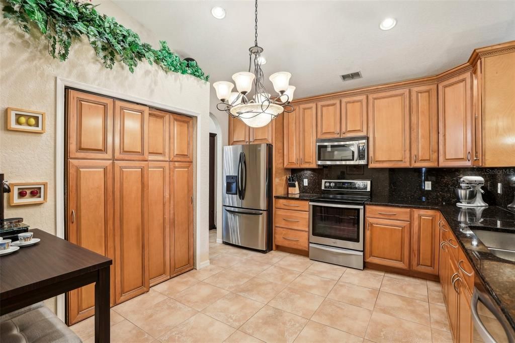 Kitchen with 42" cabinets, stainless appliances and beautiful granite counters.