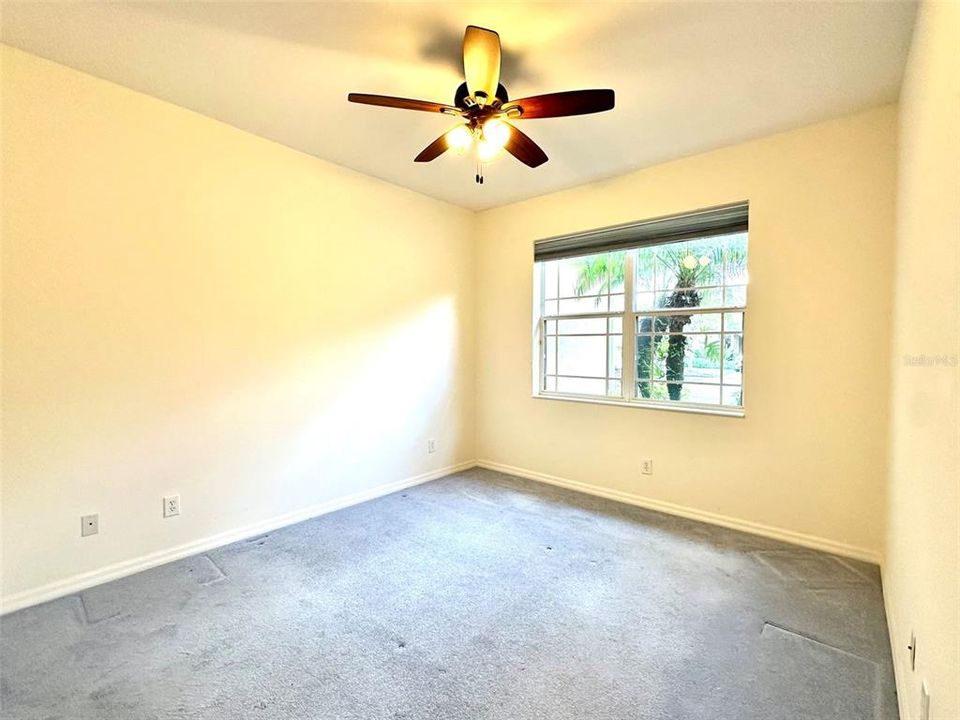 Second bedroom, in the front of the villa with window to front yard