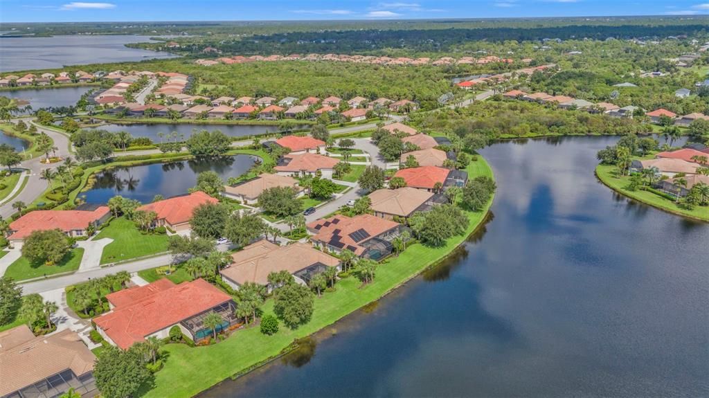 DRONE VIEW OF LARGE POND LARGE WATER VIEW