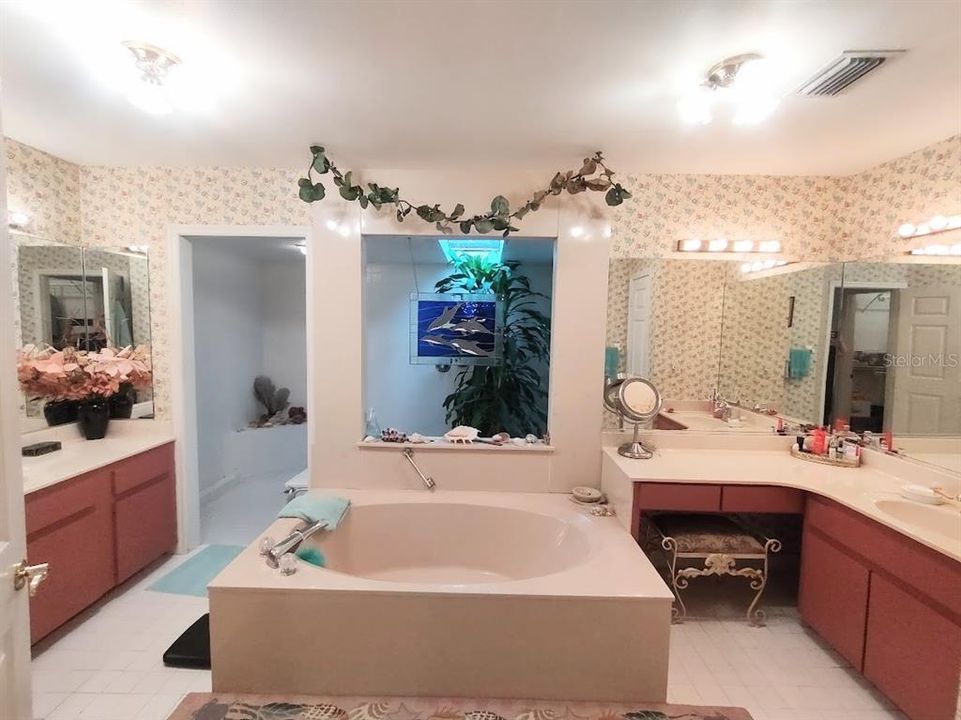 Double vanity, with a deep soaking tub