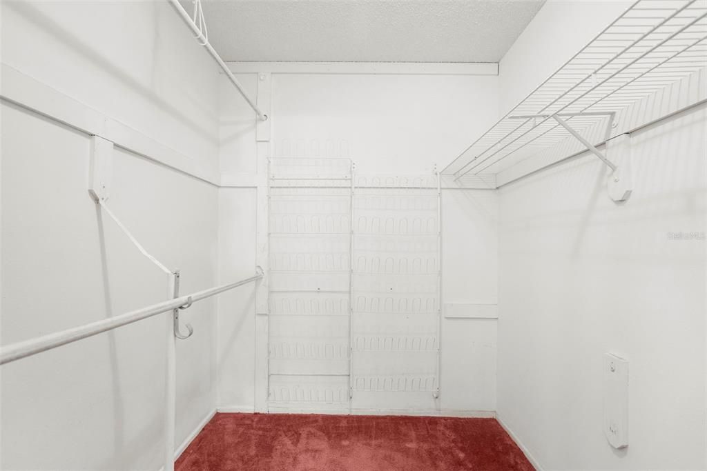 Large walk in closet in primary bedroom