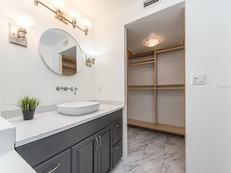 Large vanity with Custom closets