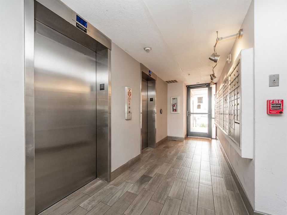 Elevators and mailboxes, leading to the pool and boat areas