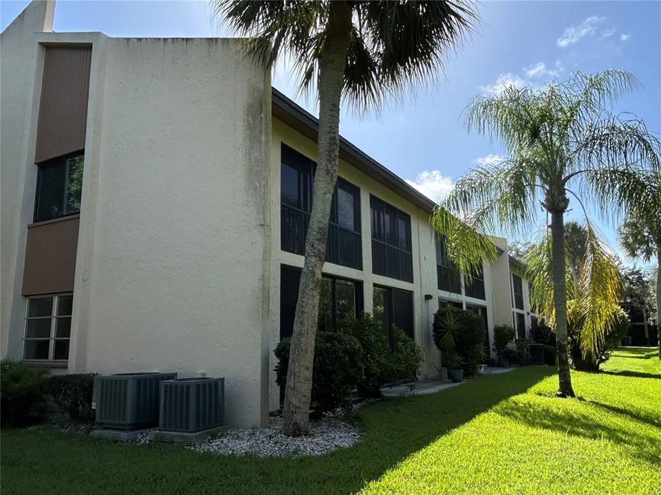 Rear view of this 2nd story condo